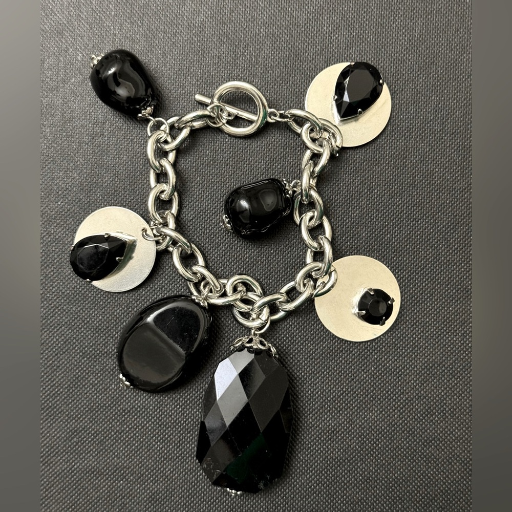 Silver and black charm bracelet
